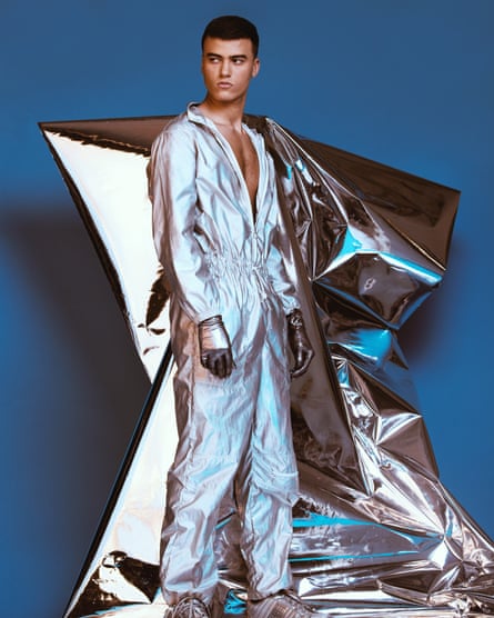 Model in silvery space glam rock jumpsuit