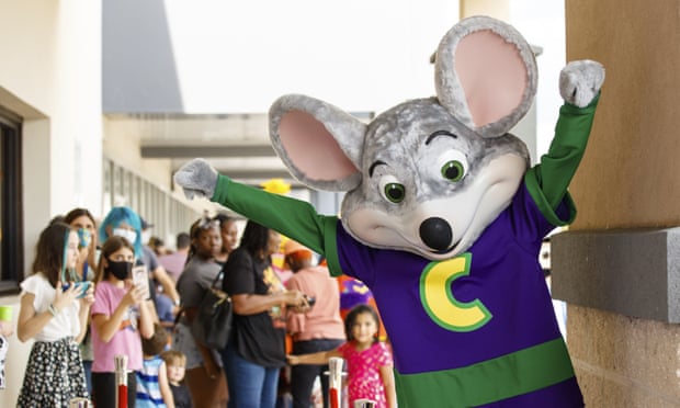 Families attend Chuck E Cheese's Beach Party Bash in June 2021 in Florida.