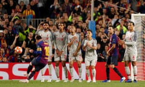 Barcelona’s Lionel Messi scores their third goal from a free kick.