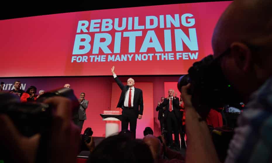Jeremy Corbyn waves to the crowd after delivering the keynote speech in Liverpool.