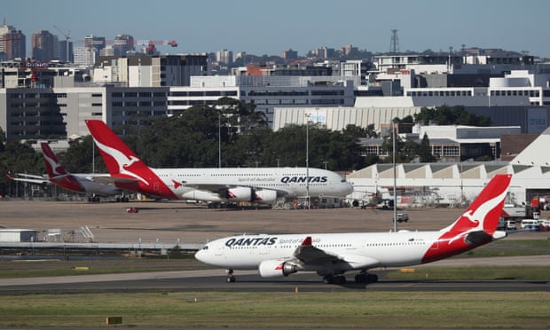 Qantas planes on an airport tarmac