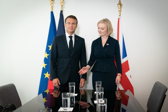 Liz Truss posed for a photograph with Emmanuel Macron, the French president, as they held their first bilateral meeting since Truss told Tory campaigners the jury was still out on whether Macron was
