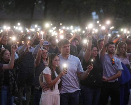 People attend a vigil for Charlie Kirk in Orem, Utah.