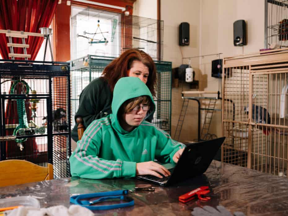 Tracie Higgins and her son, Mark, at their home in Manitowoc, Wisconsin.