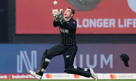 New Zealand’s Tom Latham catches the ball to dismiss Bangladesh’s captain Shakib Al Hasan.