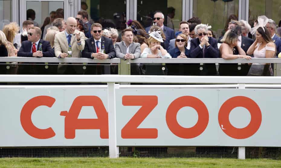a cazoo sign at the epsom derby