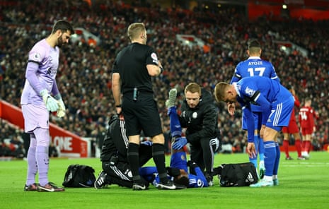 Patson Daka receives medical attention after a leg injury.