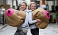 Kris Hallenga and her twin sister Maren Hallenga during a flashmob for breast cancer charity CoppaFeel!