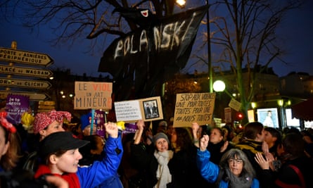Activists gather outside the location of the Césars awards to protest against the nominations of Roman Polanski’s film.