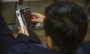 A Chinese investor at a brokerage house in Beijing, today.
