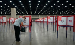 A voter completes her ballot in Louisville
