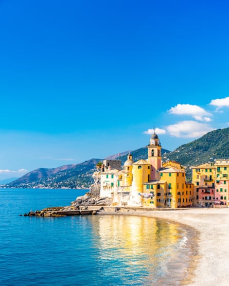 Scenic Mediterranean riviera coast. Panoramic view of Camogli town in Liguria, Italy. Basilica of Santa Maria Assunta and colorful palaces. Liguria, ItalyScenic Mediterranean riviera coast. Panoramic view of Camogli town in Liguria, Italy. Basilica of Santa Maria Assunta and colorful palaces. Italy