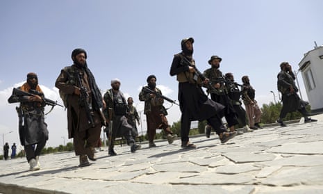 Taliban fighters patrol in Kabul.