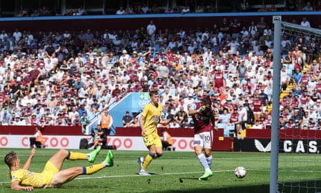 Aston Villa's Emiliano Buendia scores their second goal.