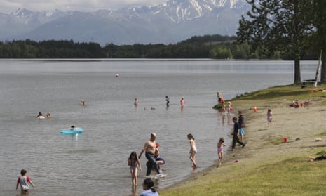 People cooling off in Wasilla Lake in Wasilla, Alaska, last month.