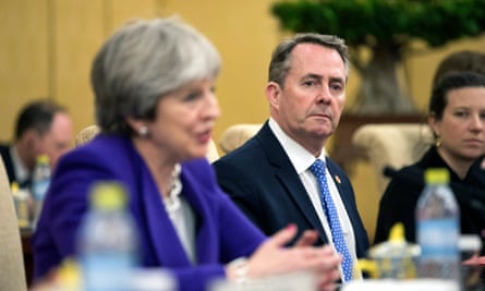 Trade secretary Liam Fox watches as Theresa May speaks during a bilateral meeting with China’s President Xi Jinping.