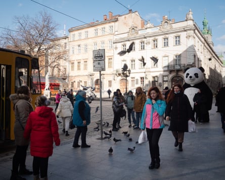 People strolling through the city centre of Lviv