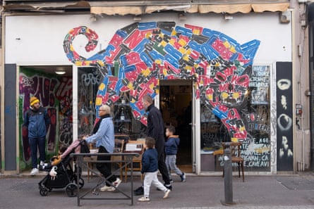 The front of the bar has a huge illustrated cat made of coloured letters around the door.