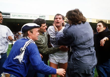 Glen Hoddle is mobbed by Spurs fans after their FA Cup semi-final victory against Watford in 1987.