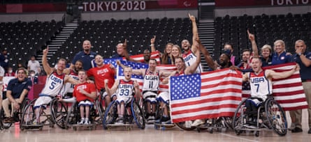 The US team celebrates after winning the wheelchair basketball men’s gold medal.