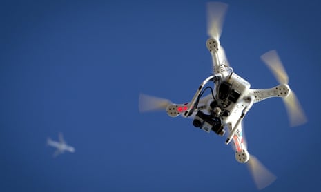 drone flying under aeroplane