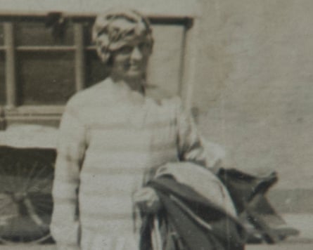 a black and white picture of a woman walking