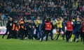 The losing side’s fans stormed on to the pitch to confront Fenerbahce's players