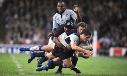 Dan Carter is tackled simultaneously by Vincent Clerc and Thierry Dusautoir during New Zealand’s 20-18 defeat by France in the 2007 World Cup quarter-final.
