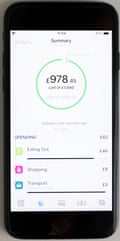 A phone with the Monzo app active