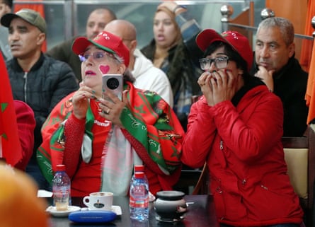 Morocco fans react as they watch the match in Casablanca.