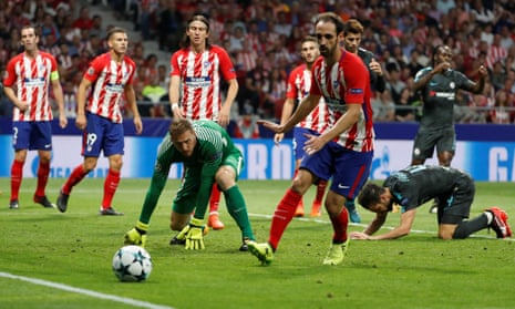 Relief for the Atlético players and despair for the Chelsea players as Cesc Fabregas puts the ball the wrong side of the post.
