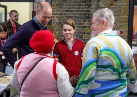 The Prince of Wales and Prince George with Brain and Sarah, service users of the passage in central London.