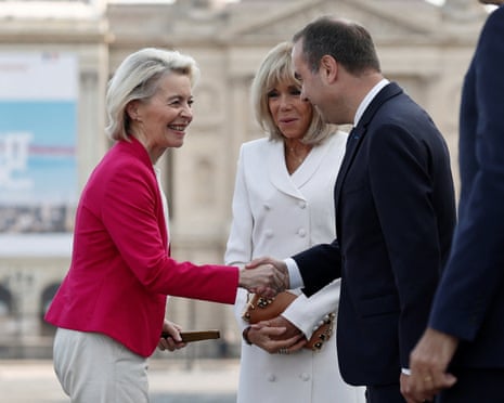 French prime minister Sébastien Lecornu and Brigitte Macron, wife of French president Emmanuel Macron, welcome European Commission president Ursula von der Leyen before the start of the annual Bastille Day military parade.