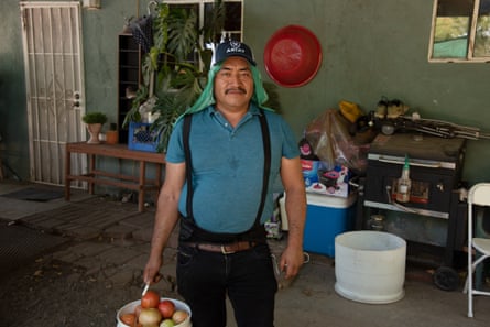 Jesús Zuñiga, a tomato picker, says that working long hours has become unbearable due to the heat.