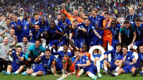 Chelsea players pose with the trophy after winning the FIFA Club World Cup.