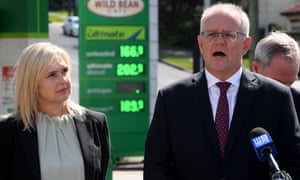 Jenny Ware and Scott Morrison outside a petrol station