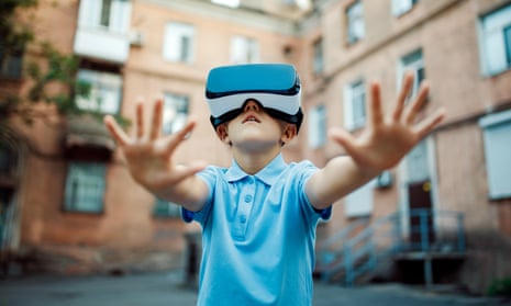 Boy wearing virtual reality goggles