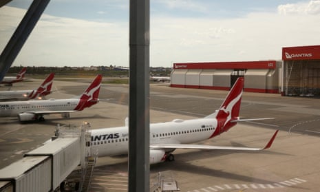 Qantas planes are seen at the domestic terminal at Sydney Airport.