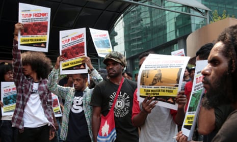 West Papuan activists at a rally calling for the nationalisation of the Indonesian unit of a US-based mining compan, and the right to self-determination for West Papua.