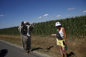 A cycling fan dressed as an elephant awaits the peloton during the eighth stage of the Tour de France
