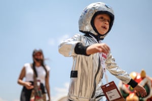 A child dressed as an astronaut