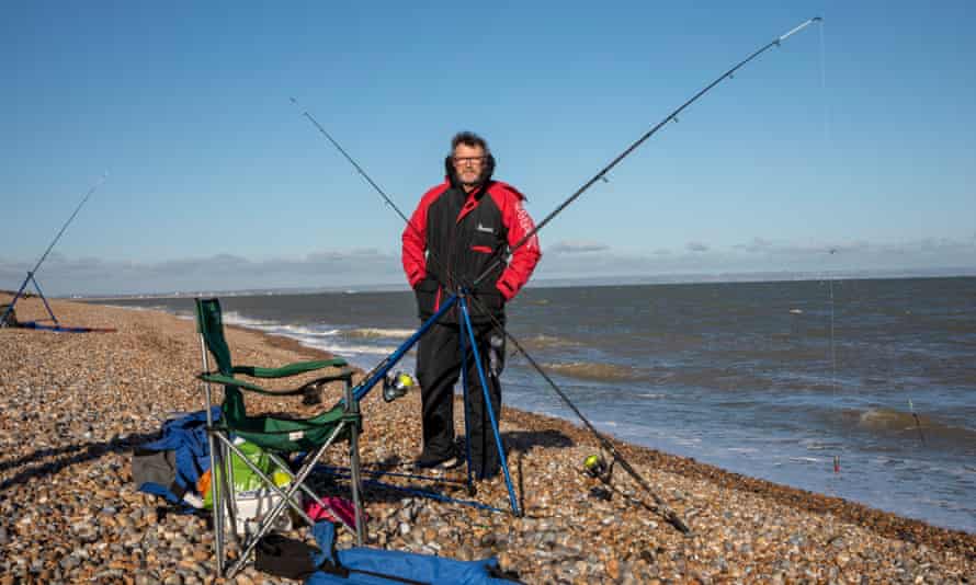 Ian Fraser from Tunbridge Wells fishing at Dungeness beach