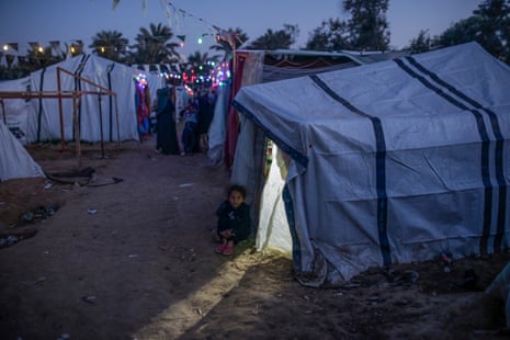 Banners and lanterns decorate tent, on the eve of the holy month of Ramadan in Deir Al Balah.