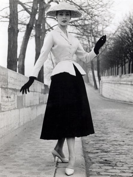 A model wears a suit by Christian Dior.