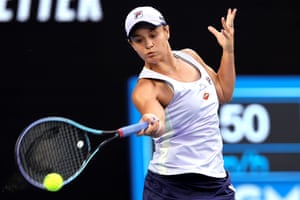 Australia’s Ashleigh Barty hits a return against Shelby Rogers.