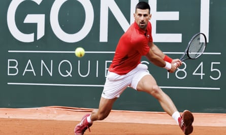 Novak Djokovic launches a return against Yannick Hanfmann.