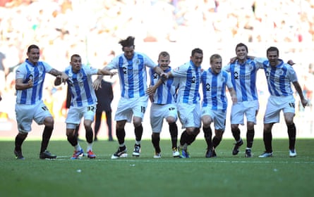 Huddersfield celebrate promotion to the Championship.