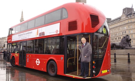 The-then London mayor Boris Johnson pictured on the-then new Routemaster prototype in 2011