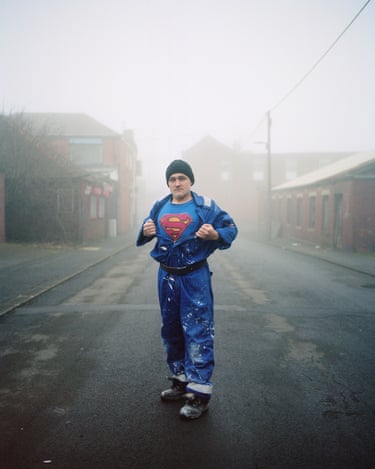 //www.theguardian.com/artanddesign/gallery/2025/nov/12/the-taylor-wessing-photo-portrait-prize-tenderness-traditions-and-a-table-of-hair