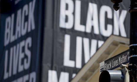 A banner reads Black lives matter in Washington DC.